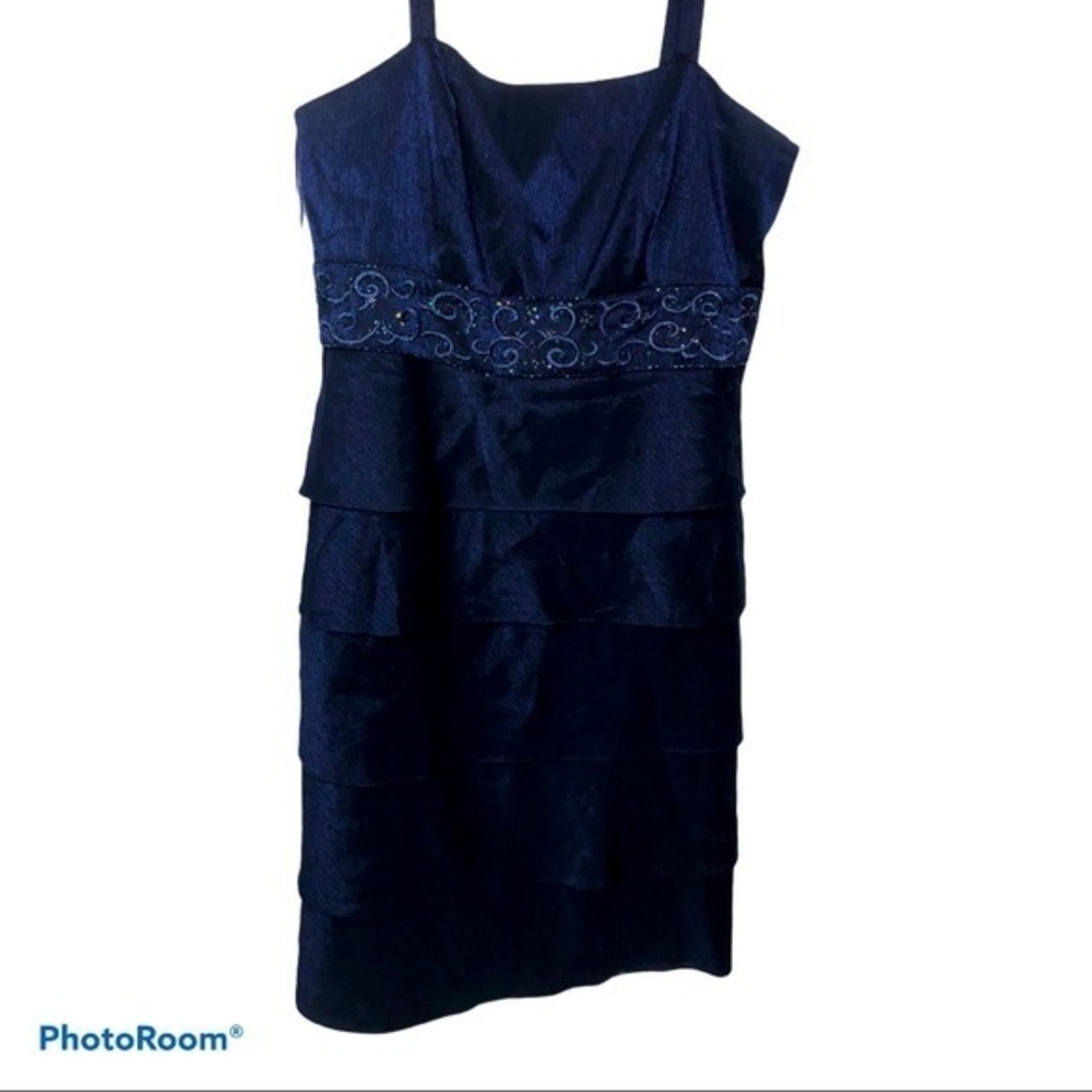 Dark blue cocktail dress by Kathy Roberts.